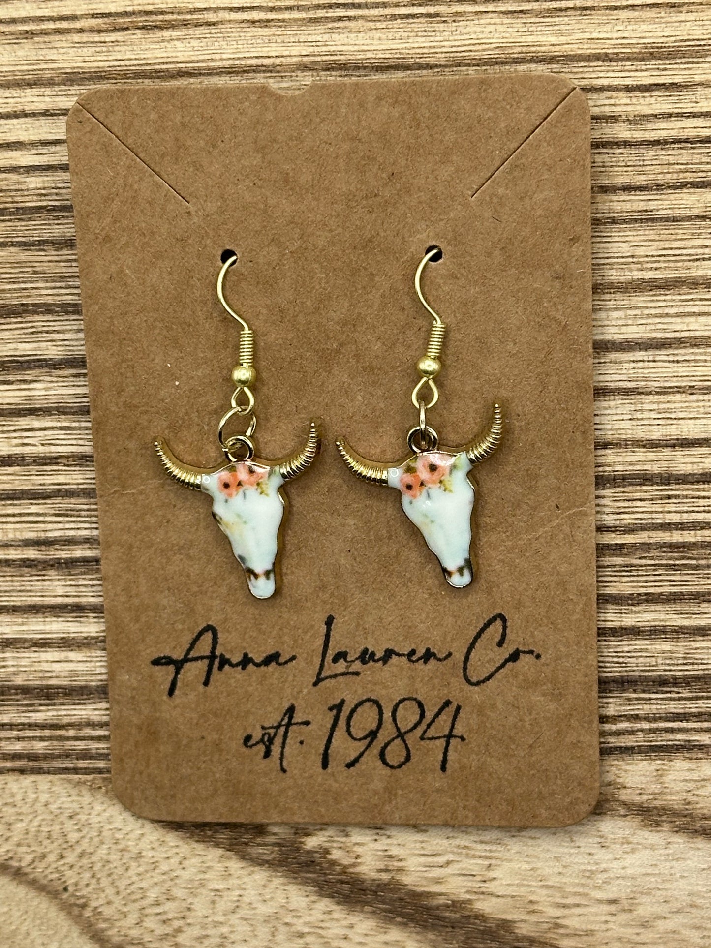 Floral cow earrings